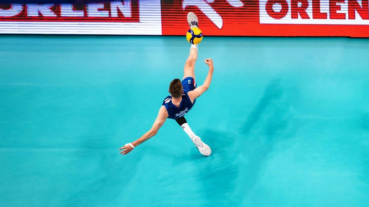 Can you kick a volleyball in a game,or will get a foot fault?