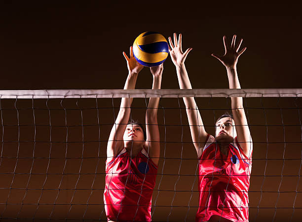 See picture of volleyball game: Awesome Photos of Spikes, Blocks & Dives!