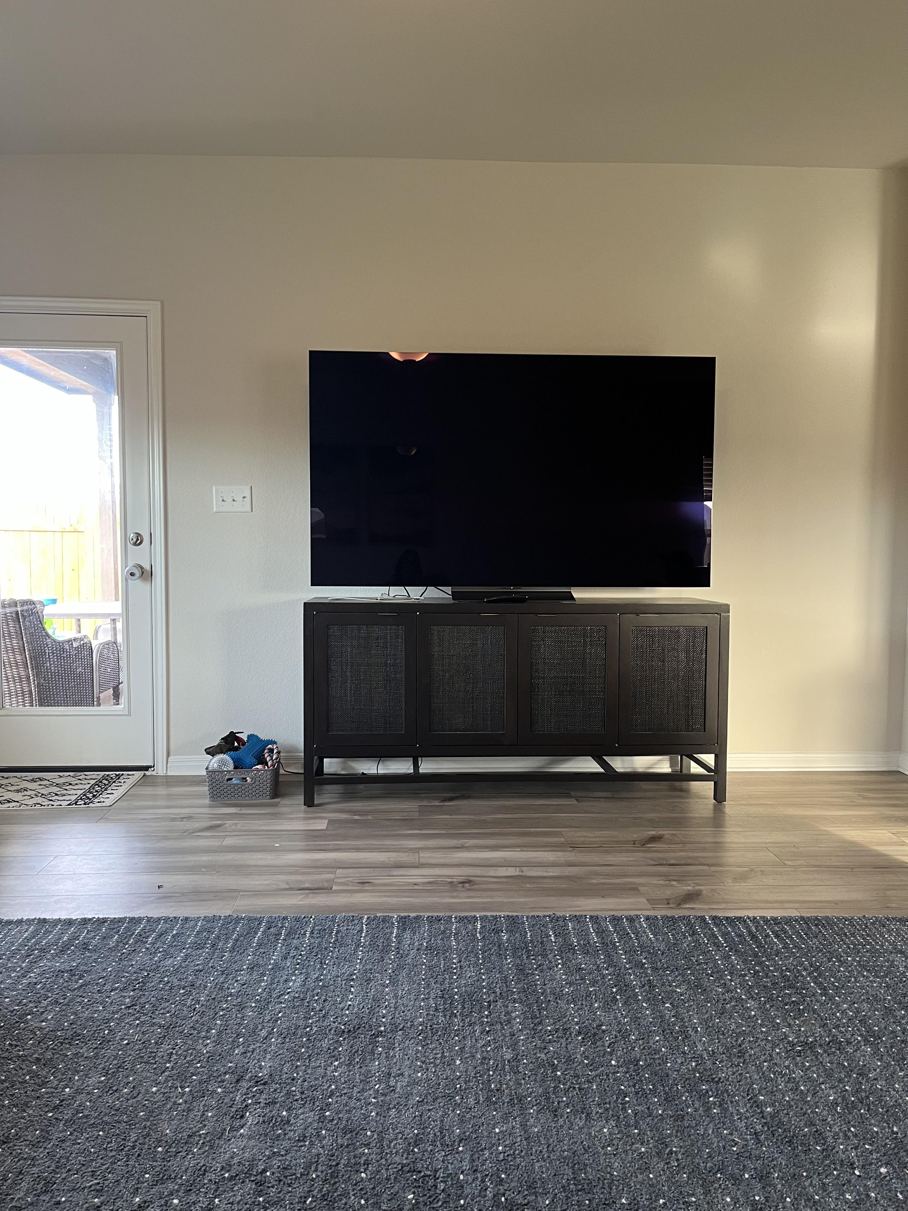 TV Too Big for Entertainment Center? Try These Quick Tips!